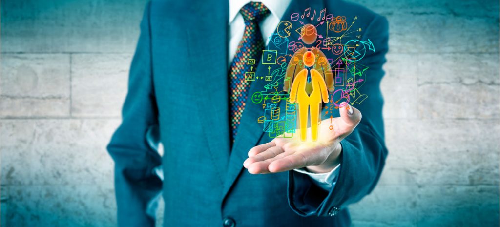 Imagen de empresario del automóvil con un muñeco que crece. Concepto de retención del talento.